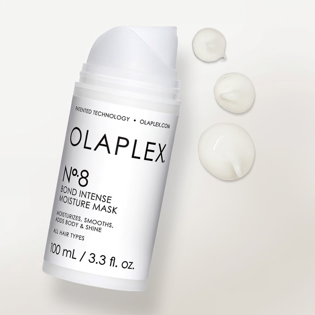 Botella con dosificador airless de Olaplex No. 8 Bond Intense Moisture Mask, mascarilla reparadora e hidratante intensiva, tamaño 100ml / 3.3 fl oz.
Fondo Beige