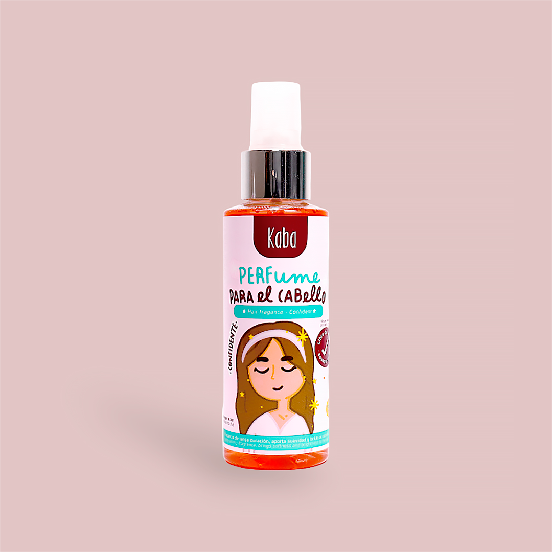 Botella de 120ml del Perfume Capilar Kaba Confidente, con etiqueta naranja-rosada y dibujo, fragancia herbal para controlar frizz y dar brillo al cabello.